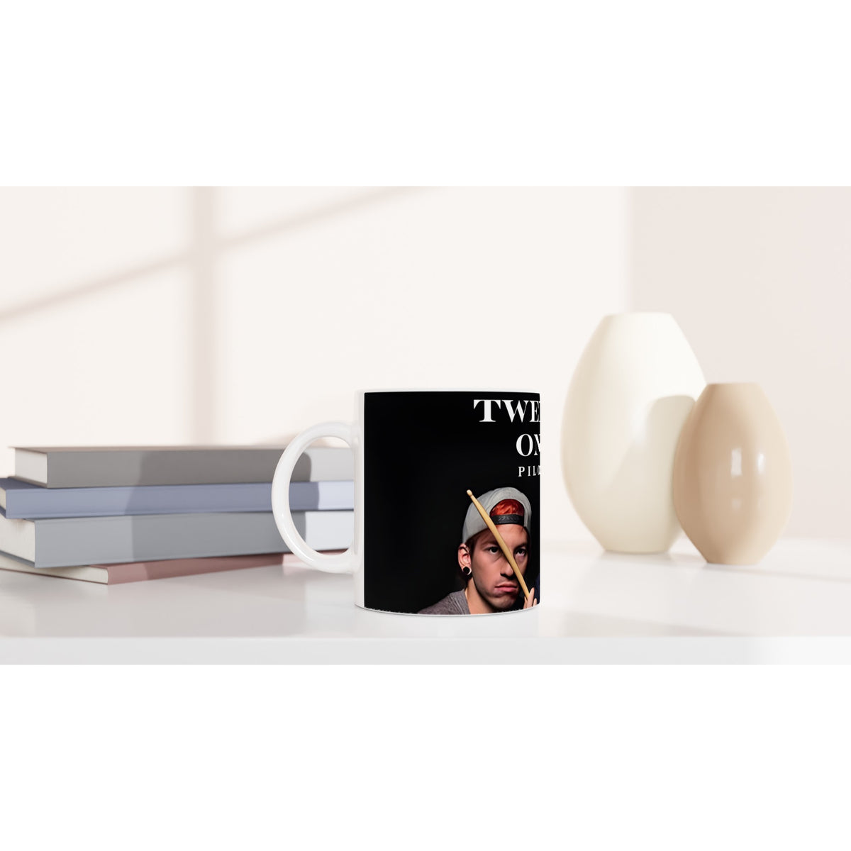 White mug with Twenty One Pilots graphic