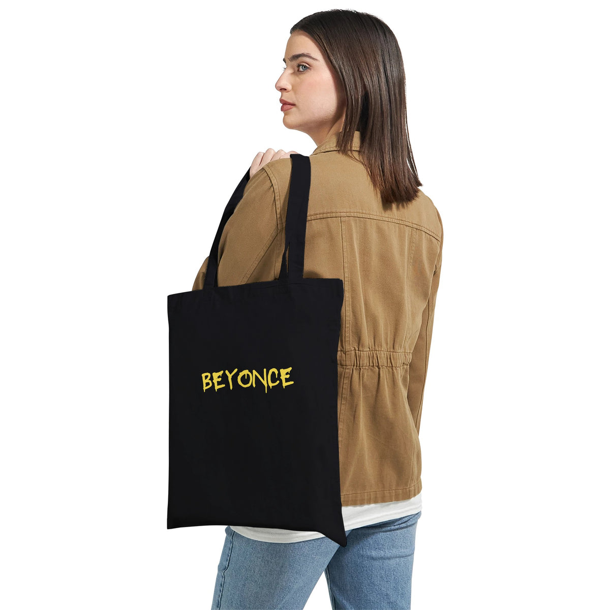 Beyoncé tote bag with bold yellow text on black