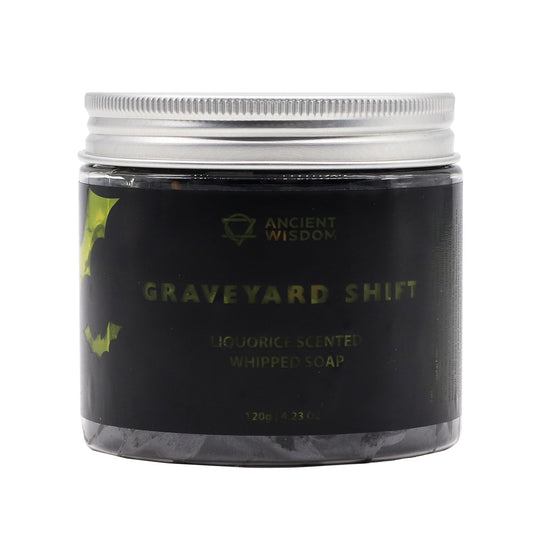 Jar of 'Graveyard Shift' liquorice-scented whipped soap with 'Ancient Wisdom' branding on a white background.
