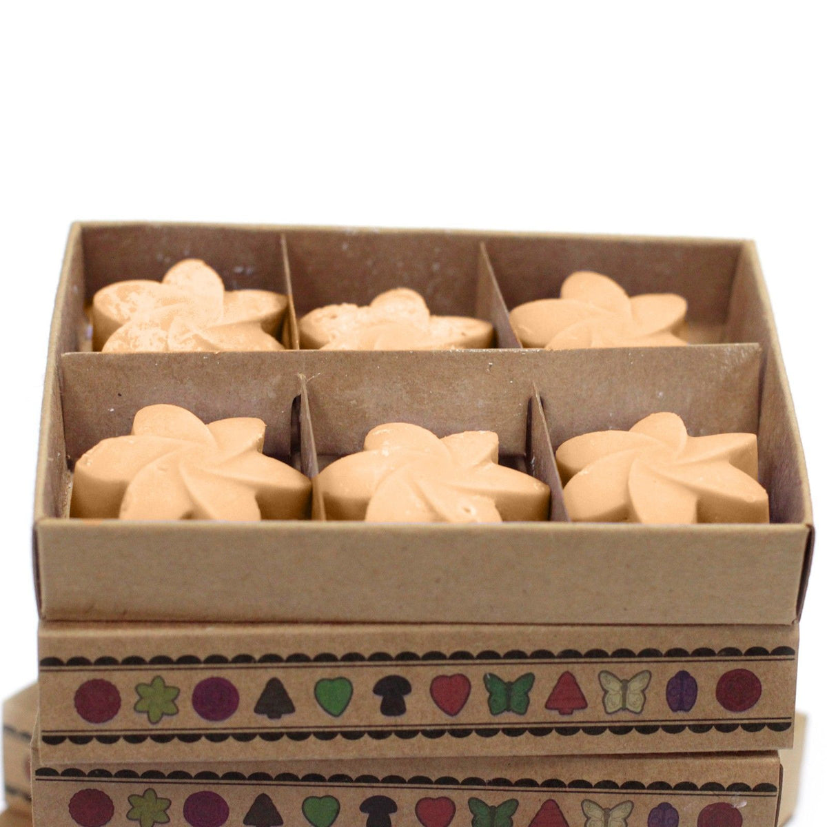 Midnight Jasmine soy wax melts arranged in eco‑friendly matchbox box