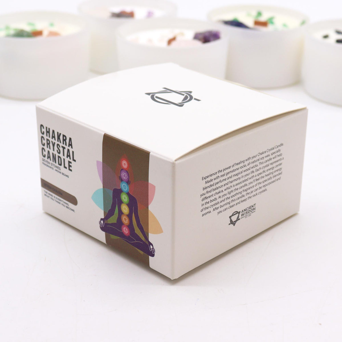 Hand‑poured chakra candle promoting balance and energy alignment