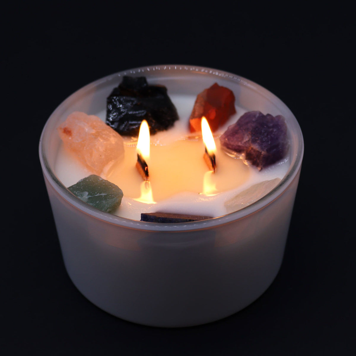 Seven chakra crystal candle designed for meditation and spiritual balance