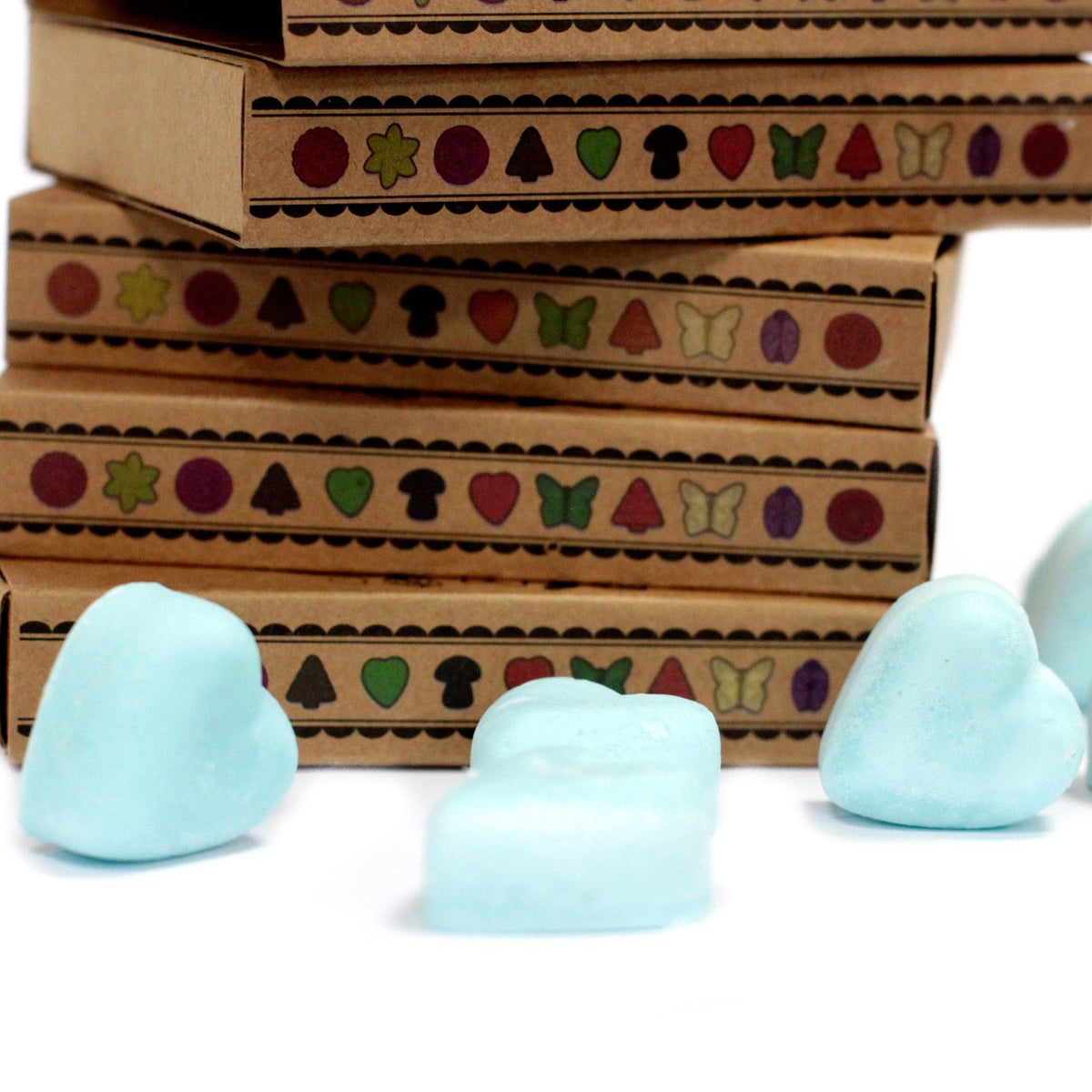 Natural soy wax melts displayed in matchbox packaging with dividers