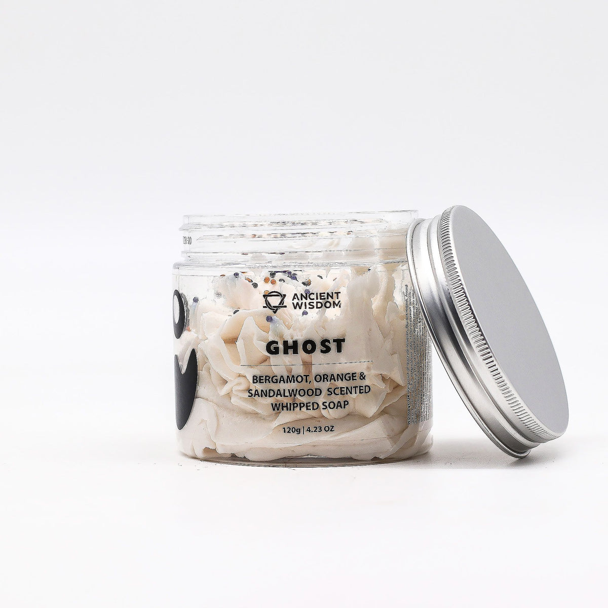 Jar of 'Ghost' whipped soap with a silver lid on a white background