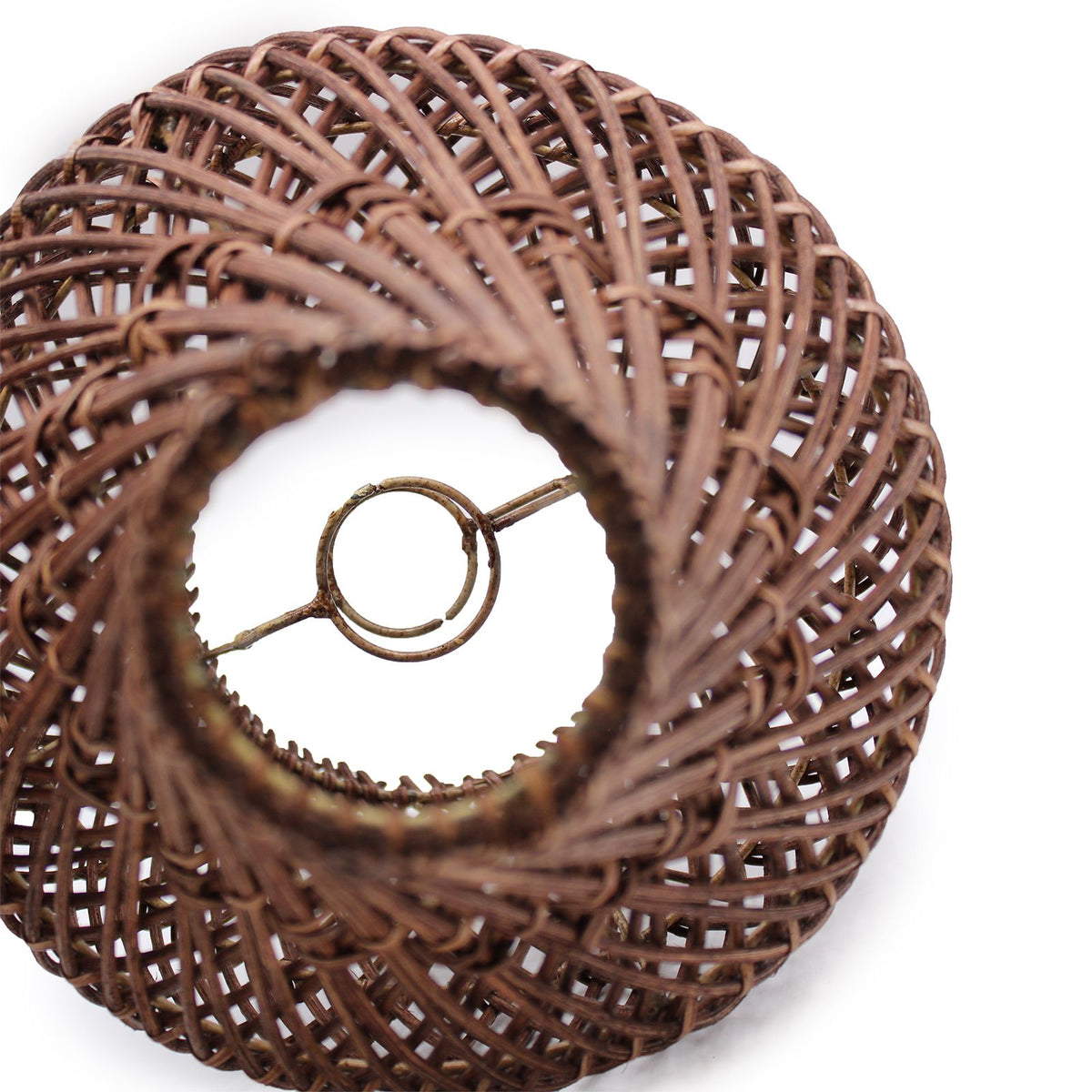 Rattan lamp creating decorative light shadows
