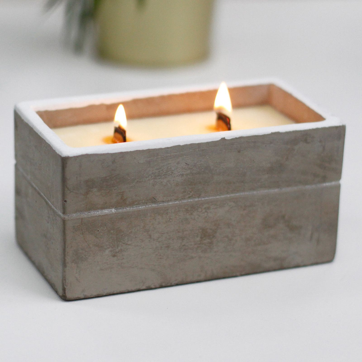 Rustic concrete pot candle with spiced lime aroma and wooden wick