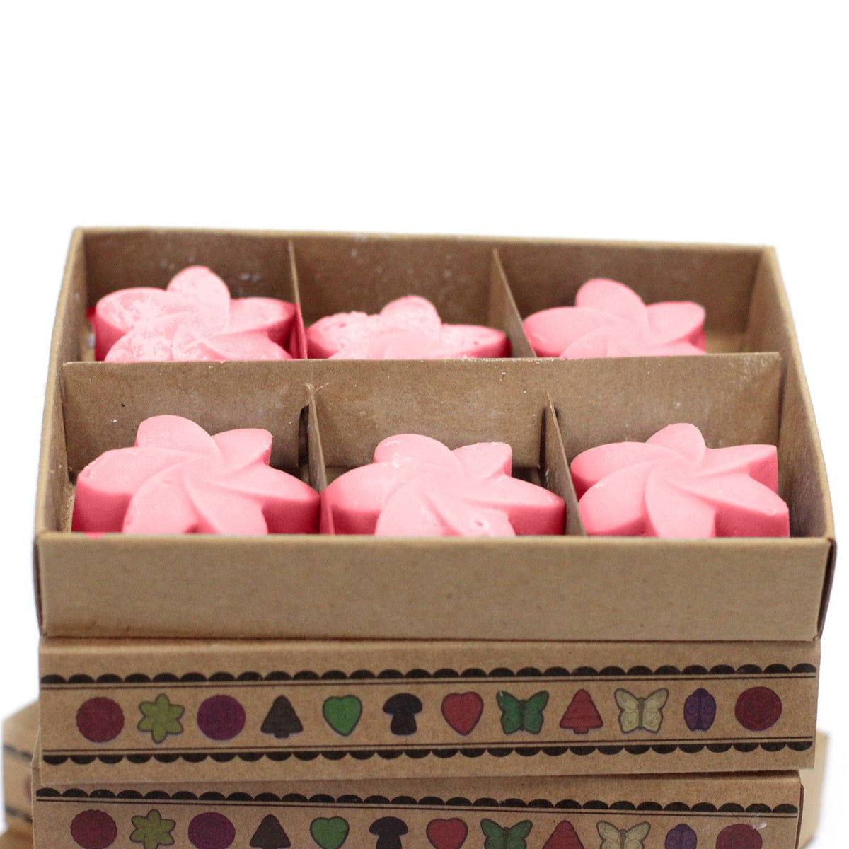 Classic Rose soy wax melts arranged in eco‑friendly matchbox box