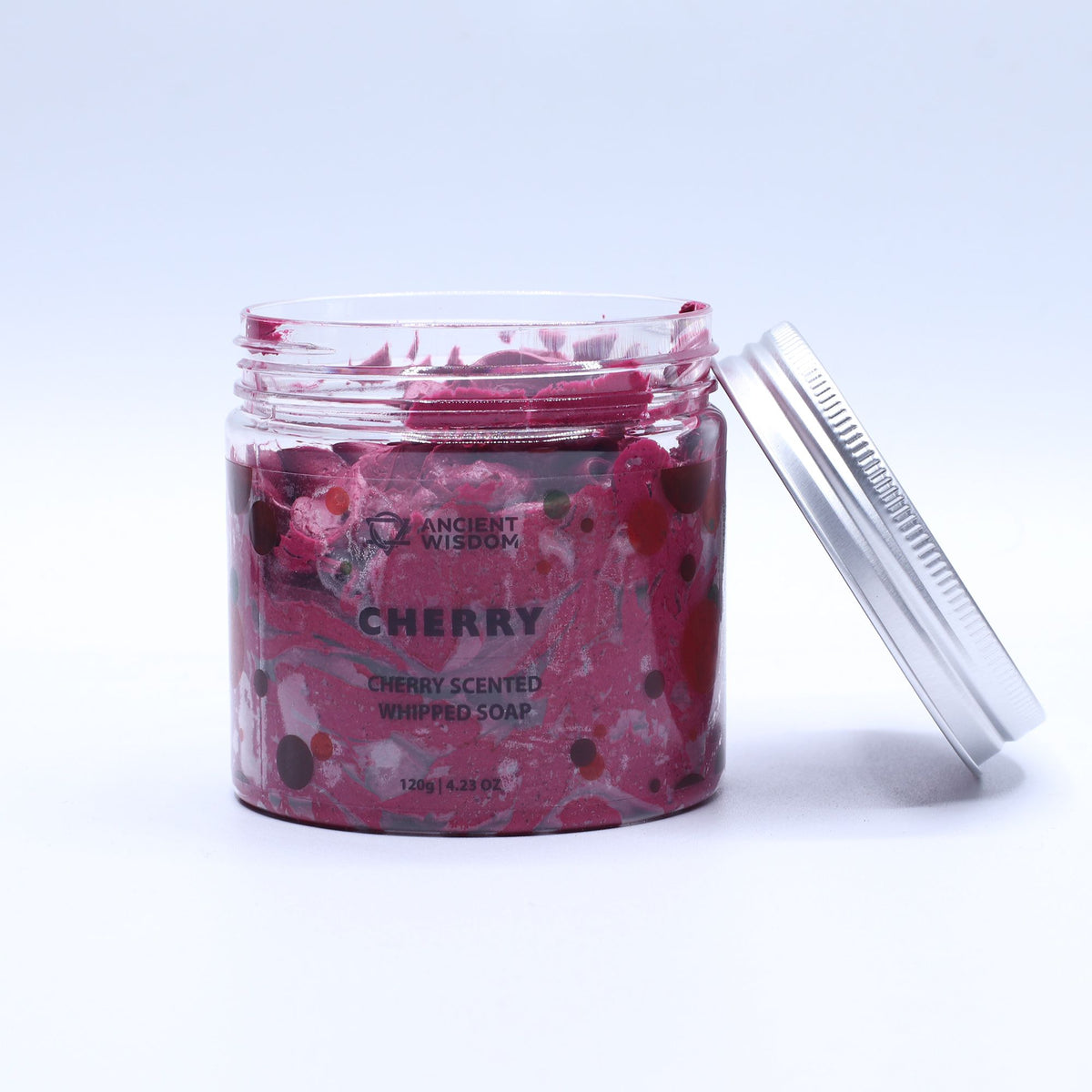 Jar of cherry-scented whipped soap with a visible brand label on a white background