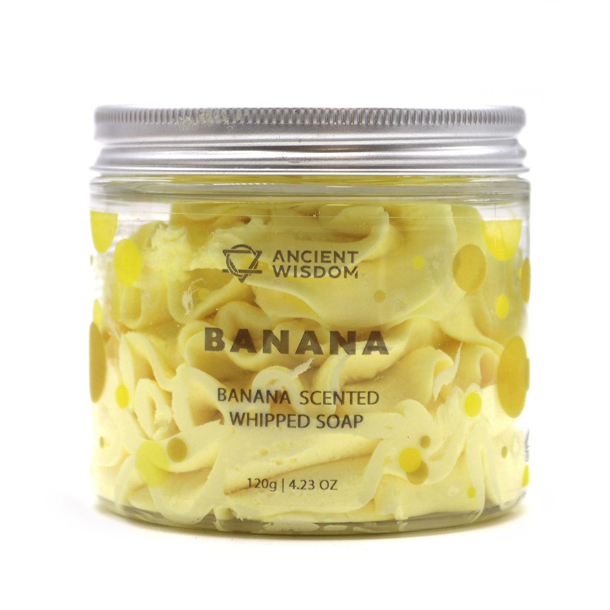 Jar of banana-scented whipped soap with 'Ancient Wisdom' branding on a white background