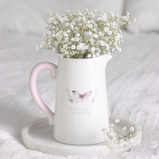 White ceramic flower jug with grey butterfly print and memorial quote