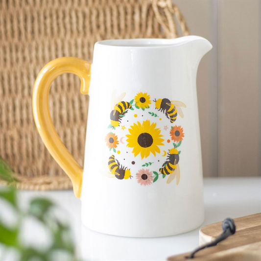 Bee and sunflower ceramic flower jug with yellow handle